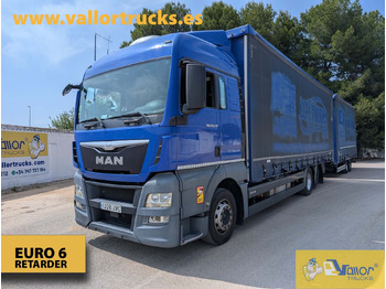 Тентованный грузовик MAN TGX 26.440