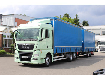 Тентованный грузовик MAN TGX 26.460