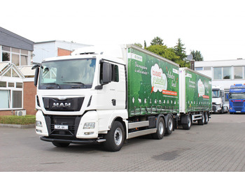Тентованный грузовик MAN TGX 26.480