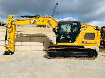 Гусеничный экскаватор CATERPILLAR