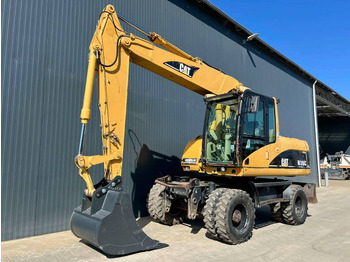 Колёсный экскаватор CATERPILLAR M316C