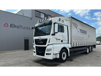 Тентованный грузовик MAN TGX 26.400