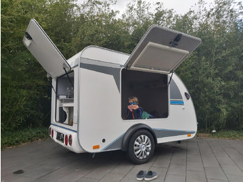 Прицеп дача Mini Camper Mini Tommy TMC25 252x140x121cm aero V1 Küche 12V/230V 100km/H 750kg gebremst Modell 24: фото 2
