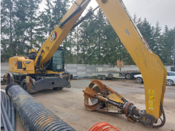 Колёсный экскаватор CATERPILLAR
