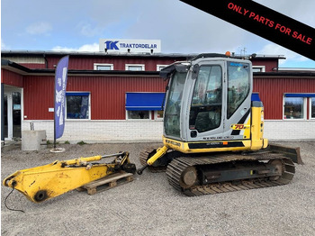 Гусеничный экскаватор NEW HOLLAND