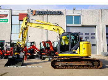 Гусеничный экскаватор NEW HOLLAND