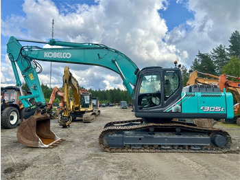 Гусеничный экскаватор NEW HOLLAND