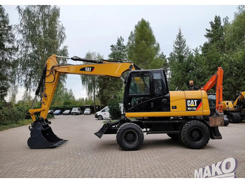 Колёсный экскаватор CATERPILLAR M313D