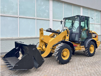 Колёсный погрузчик CATERPILLAR 906M