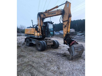 Колёсный экскаватор HYUNDAI