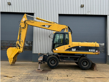 Колёсный экскаватор CATERPILLAR M322C