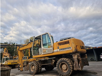 Колёсный экскаватор LIEBHERR A904C: фото 2