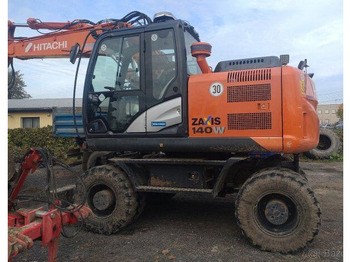 Колёсный экскаватор HITACHI ZX140W-5