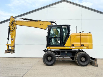 Колёсный экскаватор CATERPILLAR M314