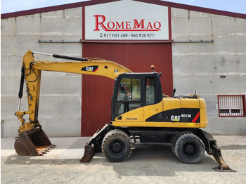 Колёсный экскаватор CATERPILLAR M313D