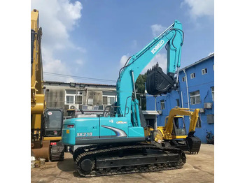 Гусеничный экскаватор KOBELCO