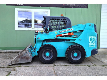 Мини-погрузчик с бортовым поворотом KATO