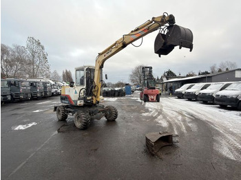 Колёсный экскаватор YANMAR