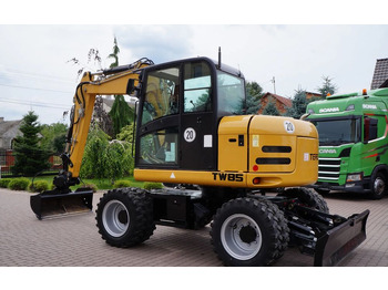Колёсный экскаватор TEREX