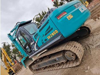 Гусеничный экскаватор KOBELCO