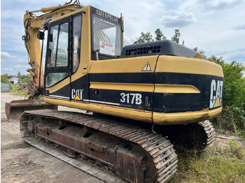 Гусеничный экскаватор CATERPILLAR