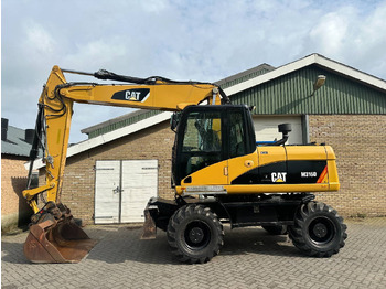 Колёсный экскаватор CATERPILLAR M316D