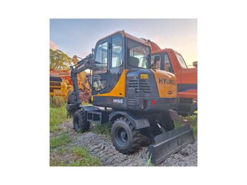 Колёсный экскаватор HYUNDAI