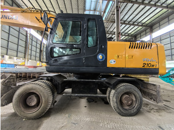 Колёсный экскаватор HYUNDAI R210