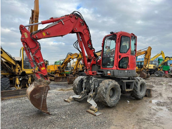 Колёсный экскаватор KOMATSU
