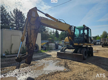 Колёсный экскаватор CATERPILLAR M316C