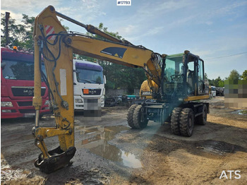 Колёсный экскаватор CATERPILLAR M315C