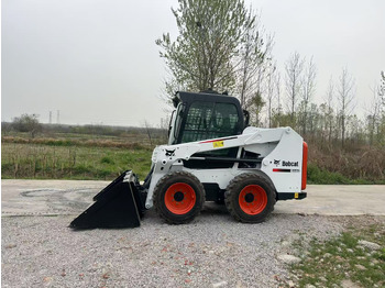 Мини-погрузчик с бортовым поворотом BOBCAT S550