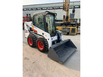 Мини-погрузчик с бортовым поворотом Bobcat S450: фото 3 Мини-погрузчик с бортовым поворотом Bobcat S450: фото 3