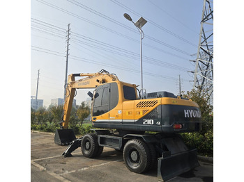 Колёсный экскаватор HYUNDAI R210