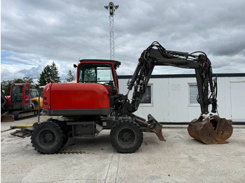 Колёсный экскаватор TEREX