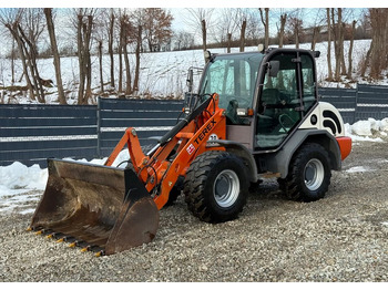 Компактный фронтальный погрузчик