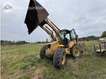 Экскаватор-погрузчик NEW HOLLAND