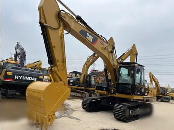 Гусеничный экскаватор CATERPILLAR 320D2