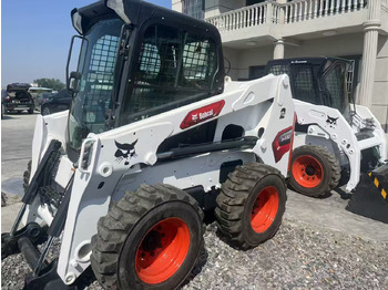 Мини-погрузчик с бортовым поворотом BOBCAT