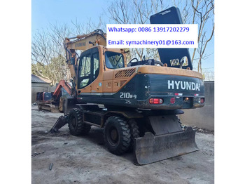 Колёсный экскаватор HYUNDAI R210