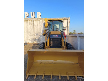 Экскаватор-погрузчик CATERPILLAR