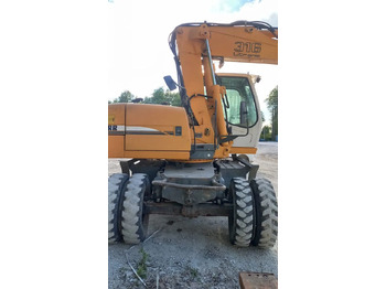 Колёсный экскаватор Liebherr A316: фото 3