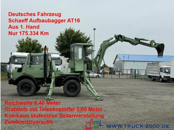Колёсный экскаватор UNIMOG