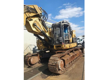Гусеничный экскаватор CATERPILLAR