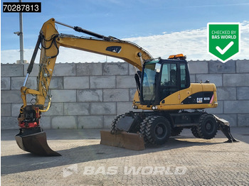 Колёсный экскаватор CATERPILLAR M313D