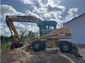 Колёсный экскаватор CASE
