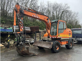 Колёсный экскаватор VOLVO EW140D