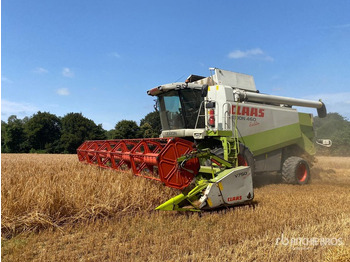 Косилка-измельчитель/ Мульчер 2003 Claas Lexion 460 Evolution Caterpillar C9 engine, with hea ... Combine Harvester: фото 2