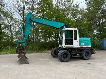 Колёсный экскаватор CATERPILLAR M313D