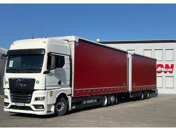 Тентованный грузовик MAN TGX